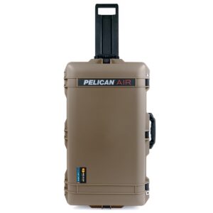 The Pelican Air 1615 by ColorCase, in Dark Desert Dirt, is a large waterproof case with black handles and latches. Perfect for ample packing without sacrificing protection, it includes a retractable handle and side handle, standing upright with the brand logo on top.