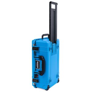 The ColorCase Pelican Air 1535 is an electric blue, medium-size waterproof carry-on featuring black handles and latches. It exemplifies durability with reinforced corners and sturdy wheels for effortless travel.